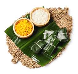 Cut banana leaves with rice isolated on white, top view. Healthy eco serving
