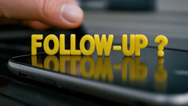 Follow-Up Reminder with Mobile Phone in Office Setting - Powered by Adobe