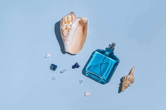 Oceanic theme with blue bottle, shells, and gemstones