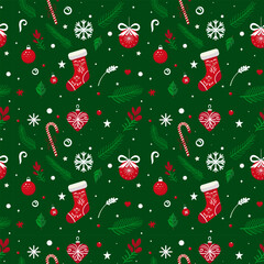 Christmas pattern with balls, sweets, snowflakes, socks on a green background. Seamless background perfect for use in textiles, wallpapers, and festive decorations.