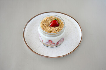 Strawberry magnolia dessert. Magnolia with strawberry and cream filling on a white background....
