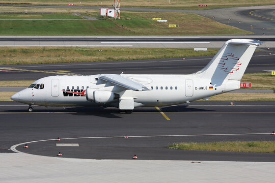 Dusseldorf, Germany - June 26, 2010: German WDL Aviation BAe 146-200 with registration D-AWUE with registration CS-TQK on taxiway at Dusseldorf Airport