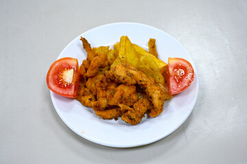 Homemade fried chicken nuggets isolated on white background. Chicken nugget. Citir tavuk. Citir, tavuk atistirma  tabagi.