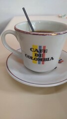 xícara de café, escrito cafe de colombia