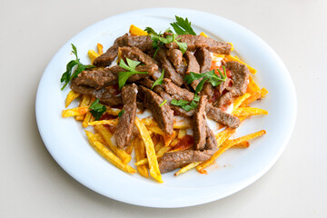 Famous Urfa meat liver, ciger wrapped by lavash with roasted chili pepper, onion and sauce in Sanliurfa, Turkey. Kuzu et ciger sis. Izgara dana bonfile, cop sis, kuzu pirzola. Karisik kebap, beyti keb