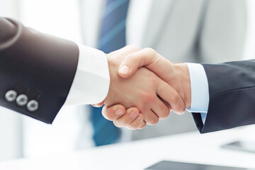 handshake between two businessmen