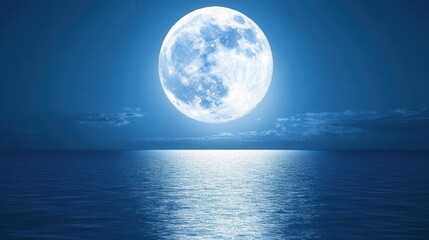 Full Moon Illuminating Calm Ocean Waters Under Clear Night Sky