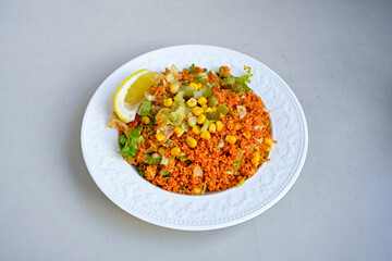 Traditional turkish bulgur pilaf with tomato sause in plate (Turkish name; bulgur pilavi, meyhane pilavi) Pirinc pilavi. Pilavustu tavuk, nohut, kuru fasulye, ciger.