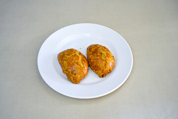 Turkish pastry product , tasty pogaca. Simit, gevrek. Turkish Pastries; peynirli, patatesli, kasarli pogaca, borek, acma, ay coregi at patisserie showcase.