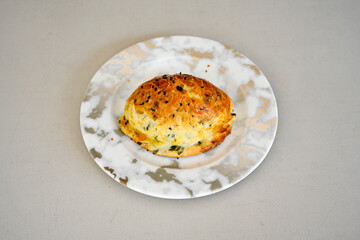 Turkish pastry product , tasty pogaca. Simit, gevrek. Turkish Pastries; peynirli, patatesli, kasarli pogaca, borek, acma, ay coregi at patisserie showcase.