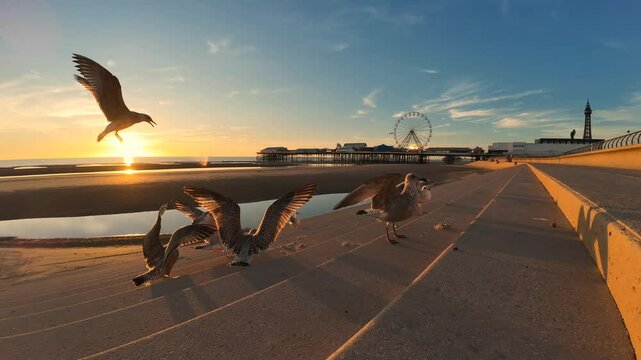 Time-lapse footage of the sunset over the Central Pier, in Blackpool, Lancashire, England, UK