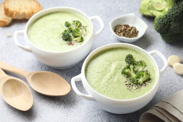Delicious broccoli cream soup served on light table