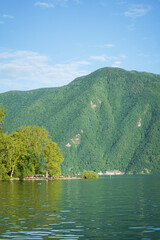 Edge of a park - Parco Ciani with by Lugano lake and green mountains in the background in Lugano, Switzerland