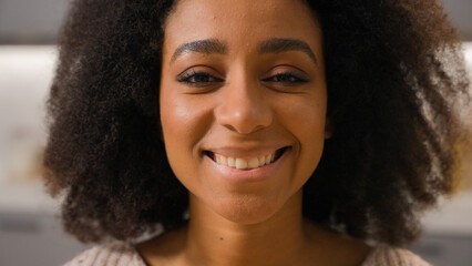 Close up portrait African American woman ethnic girl smiling cheerful girlfriend female homeowner chef cooker mother housewife happy healthy smile looking at camera home kitchen cooking food delivery
