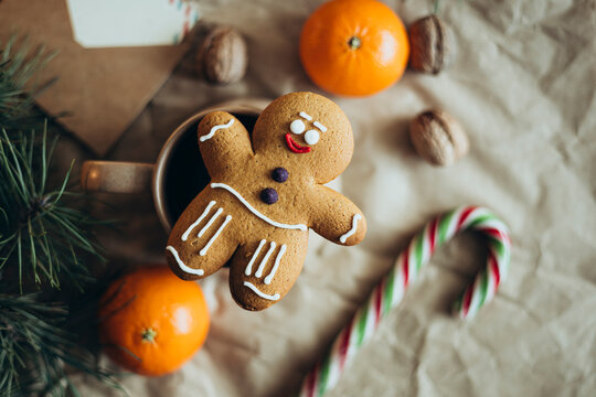 Festive gingerbread man cookie with holiday decorations