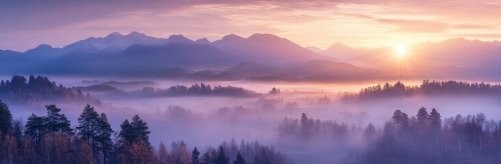 Fototapeta premium A mountain range with a sun rising over it