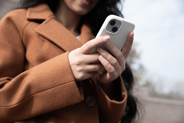 woman with a smartphone in the park