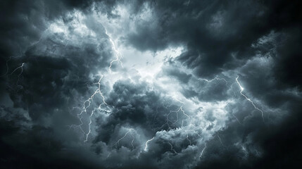 Dramatic stormy sky with dark grey clouds and bright lightning strikes