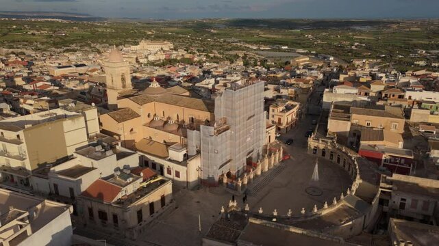 flying counter clockwise around church in Ispica Sicily