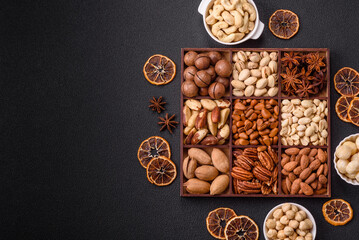 Box with various nuts cashew, macadamia, peanut, cedar, pecan, walnut, brazil, hazelnut