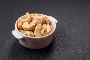 Delicious nutritious cashew nuts in ceramic bowl