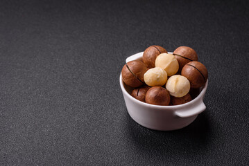 Delicious nutritious macadamia nuts in ceramic bowl