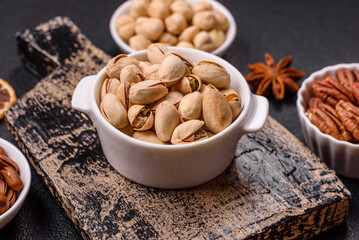 Delicious nutritious pistachio nuts in ceramic bowl