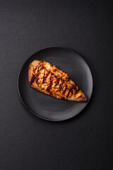 Grilled mackerel fillets with cheese, salt, spices and herbs