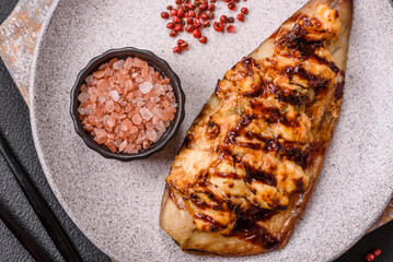 Grilled mackerel fillets with cheese, salt, spices and herbs