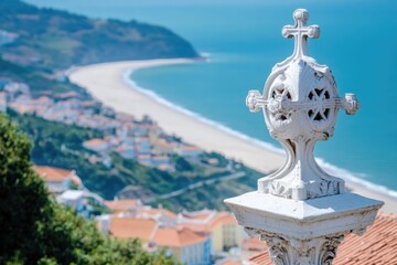 Obraz premium A cross sits atop a building overlooking the beach, perfect for use in images about faith or coastal views