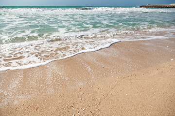 sandy beach and blue sea