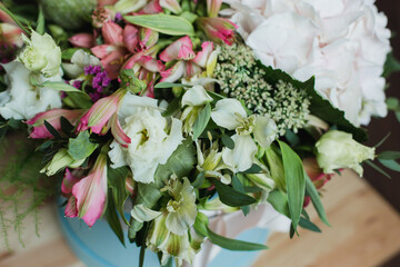Bouquet of flowers with hydrangea, alstroemeria, poppy, eustoma and greenery