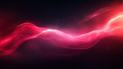 Obraz premium A vibrant abstract swirl of pink and red hues against a dark background.
