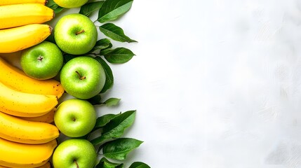 A vibrant border of ripe yellow bananas and crisp green apples with leaves, arranged on a white textured background.  Perfect for healthy eating or fruit concepts.