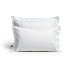 Two soft, white pillows stacked elegantly, perfect for enhancing bedroom comfort and style.