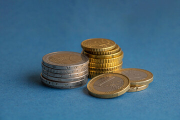 Stack of old euro coins on table, close-up shot