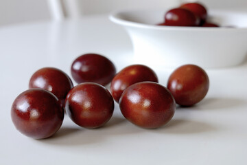 Traditional red easter eggs. Chicken eggs are painted red. High quality photo