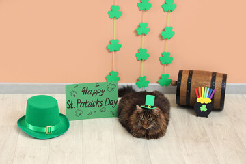 Cute cat in leprechaun hat with barrel of beer, festive postcard and decor for St. Patrick's Day...