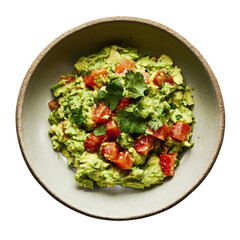 Creamy guacamole with fresh tomato and cilantro served in a rustic stoneware bowl