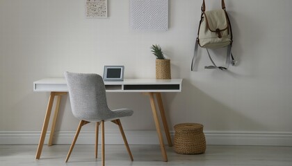 Minimalistic Yet Cozy Interior Design An Empty Desk with a Chair and a Picture Frame A Perfect Blend of Simplicity and Comfort for Your Workspace