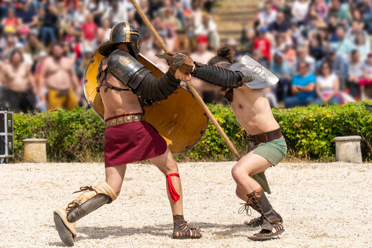 A fight of gladiators in a historical arena