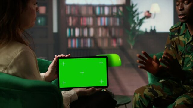 Counseling session for a army war soldier with isolated copy space display, showcasing therapy support for PTSD and reintegration into society. Armed forces soldier with flashbacks. Camera A.