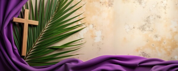 Purple fabric drapes over light beige stone surface. Palm leaves, wooden cross laid on top. Image suggests Lent season concept. Symbolic representation of Holy Week, Good Friday. Beautiful, religious