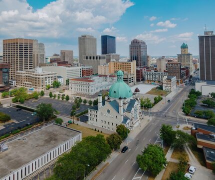 High-angle view of a city skyline with various architectural styles. Urban development and construction are evident. Downtown, Dayton, Ohio, United States