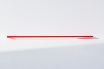 A thin, red horizontal line against a stark white background, minimalist and simple.