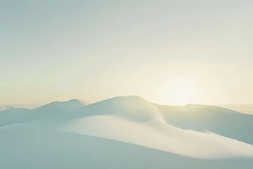 Serene snow-covered landscape bathed in soft sunlight, creating a peaceful and minimalist scene.