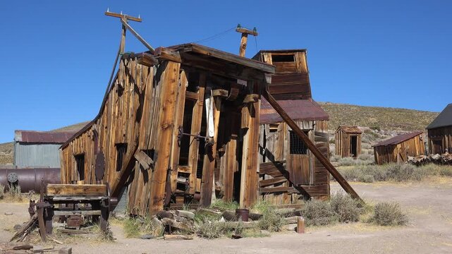 BODIE - 10.21.2024 - Exterior of a run-down industrial building in the ghost town of Bodie, California.