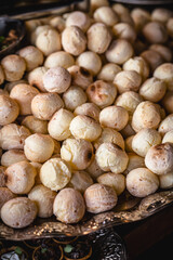 tray with cheese bread, typical Brazilian biscuit made with baked cheese, traditional food in Minas Gerais