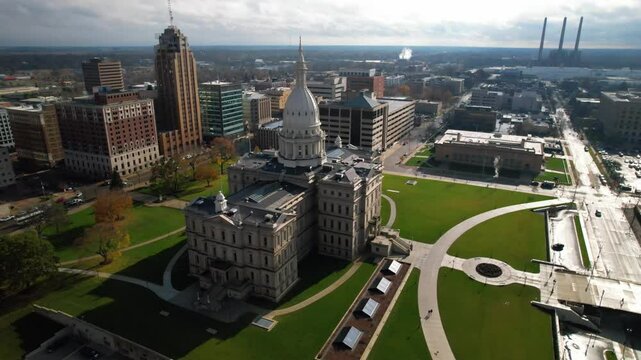 LANSING - 12.5.2024 - Great aerial footage circling counterclockwise around the Michigan State Capitol.