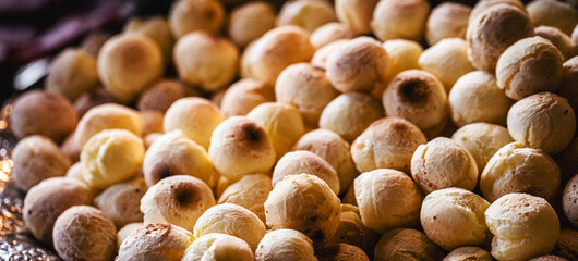 tray with cheese bread, typical Brazilian biscuit made with baked cheese, traditional food in Minas Gerais